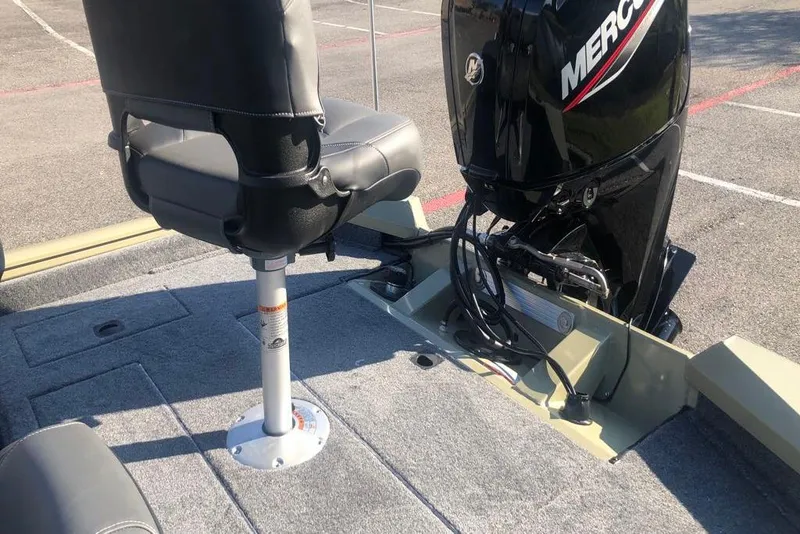 Slide: The Image of 2026 Tracker Pro Team 175 Crappie Edition boat with Mercury engine and seating. - 10