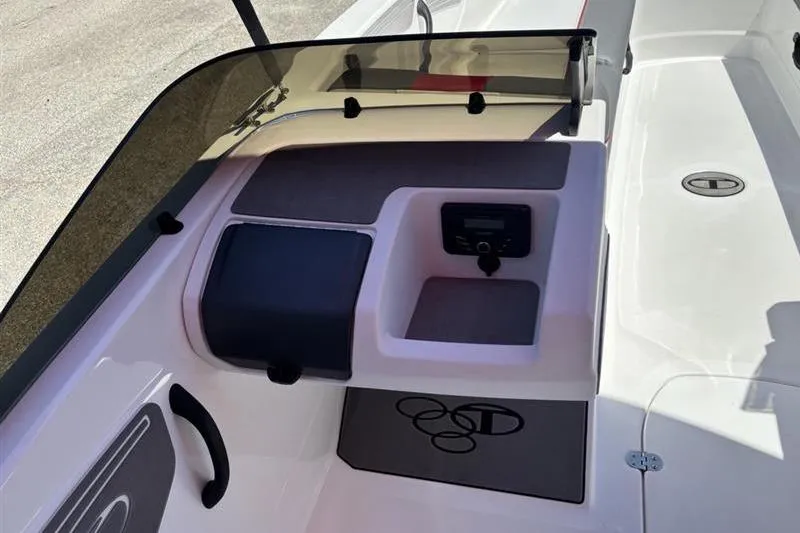 Slide: The Image of 2026 Tahoe T21 boat dashboard with sleek design and modern controls. - 8