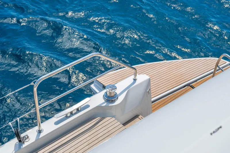 Slide: The Image of Deck of 2026 Lagoon 60 yacht with ocean view. - 22