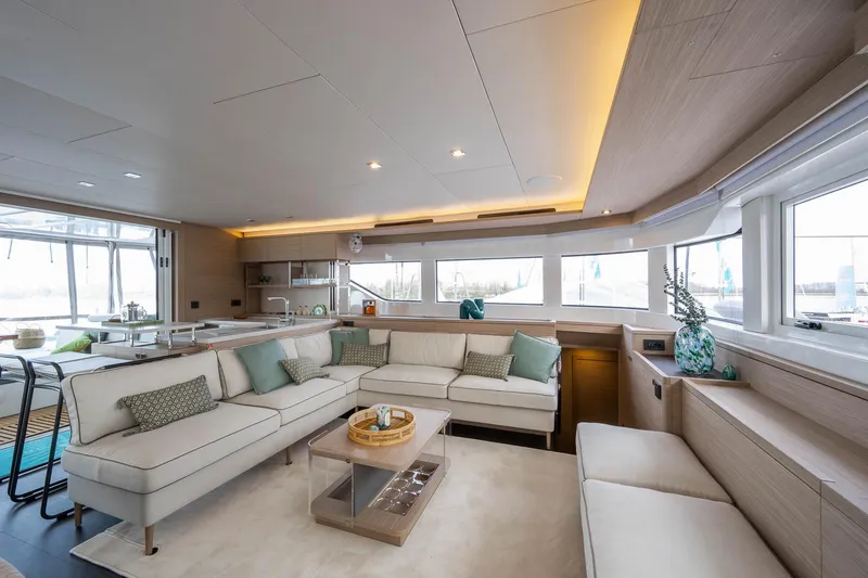 Slide: The Image of Luxurious interior of 2026 Lagoon 60 yacht with modern furnishings and panoramic windows. - 4