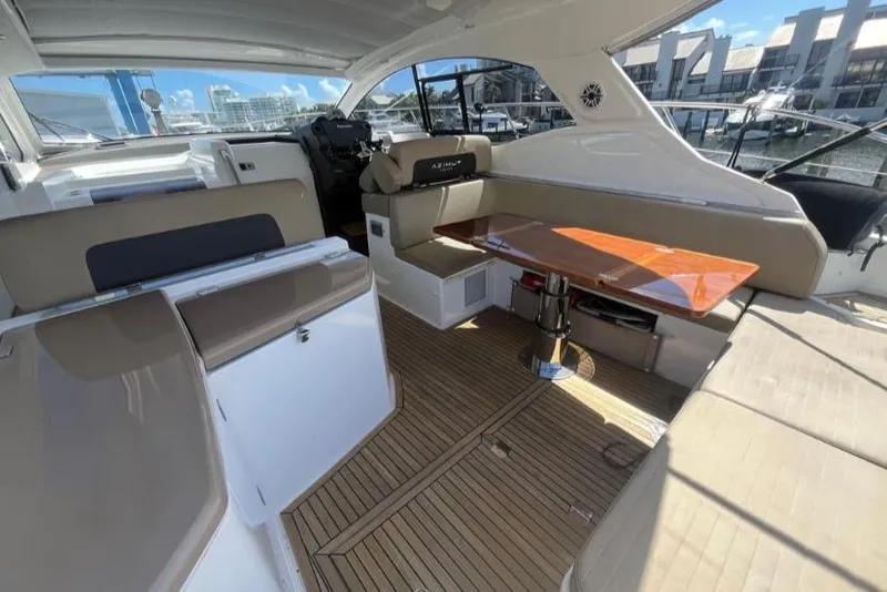 Slide: The Image of Azimut Atlantis 43 yacht deck, 2016 model, docked at marina with other boats. - 15