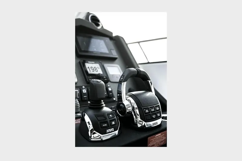 Slide: The Image of 2020 Azimut Atlantis 43 yacht on dry dock under clear blue sky. - 9