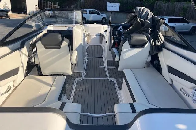 Slide: The Image of 2016 Yamaha Boats AR240 interior with spacious seating and modern design. - 4