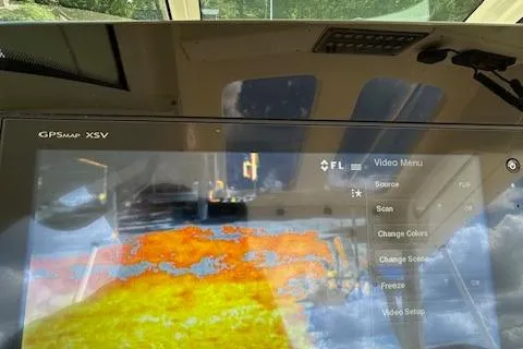 Slide: The Image of 2019 Scout 355 LXF boat with GPSmap XSV display showing thermal imaging. - 30