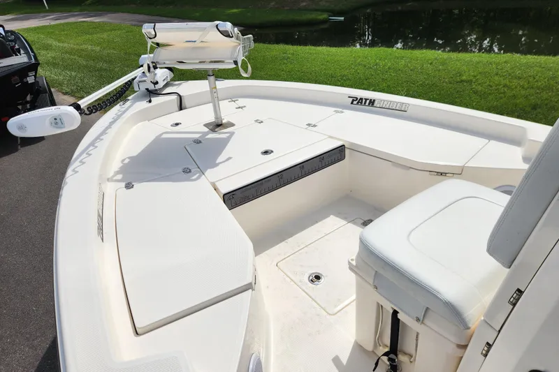 Slide: The Image of 2024 Pathfinder 2200 TRS boat deck with seating and trolling motor. - 10