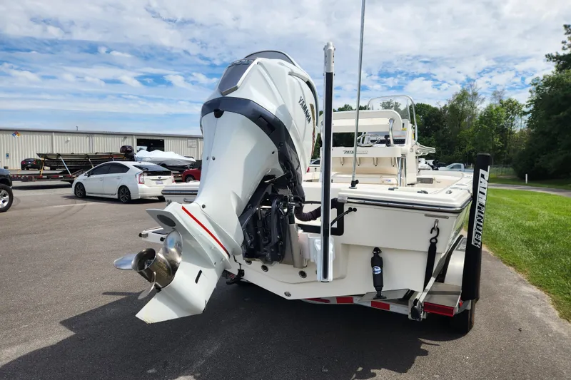 Slide: The Image of 2024 Pathfinder 2200 TRS boat with Yamaha outboard motor on trailer. - 4