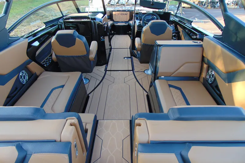 Slide: The Image of 2026 Yamaha Boats 255XD interior with luxurious seating and modern design. - 7
