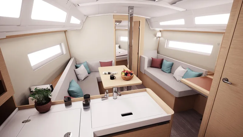 Slide: The Image of Interior of 2026 Jeanneau Sun Odyssey 380 yacht, featuring modern seating and dining area. - 12