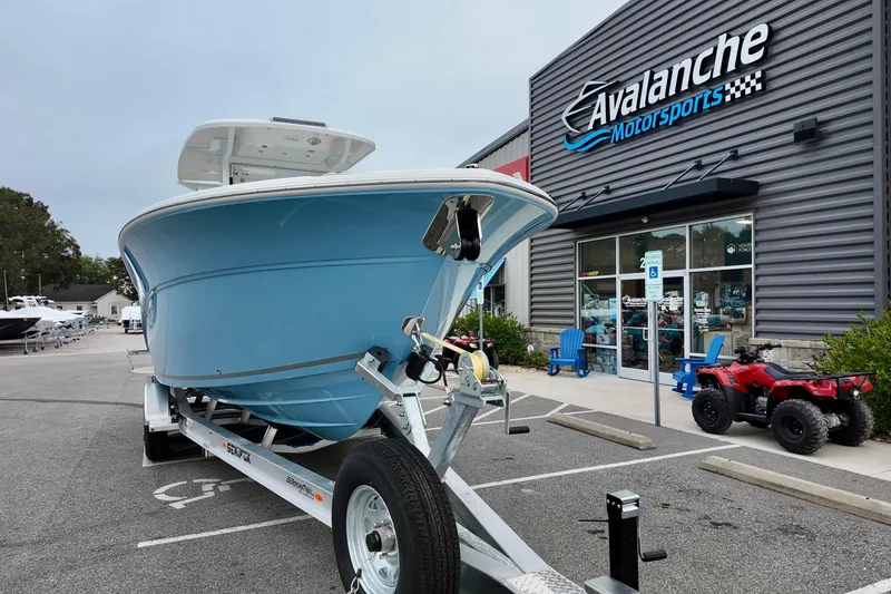 Slide: The Image of 2026 Sea Fox 288 Commander boat on trailer at Avalanche Motorsports dealership. - 4