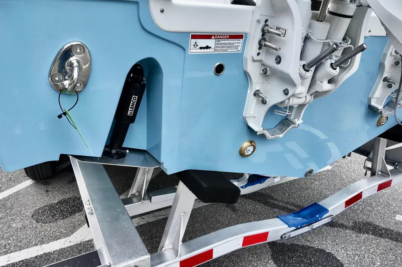Slide: The Image of 2026 Sea Fox 288 Commander boat on trailer, showcasing rear details and components. - 6