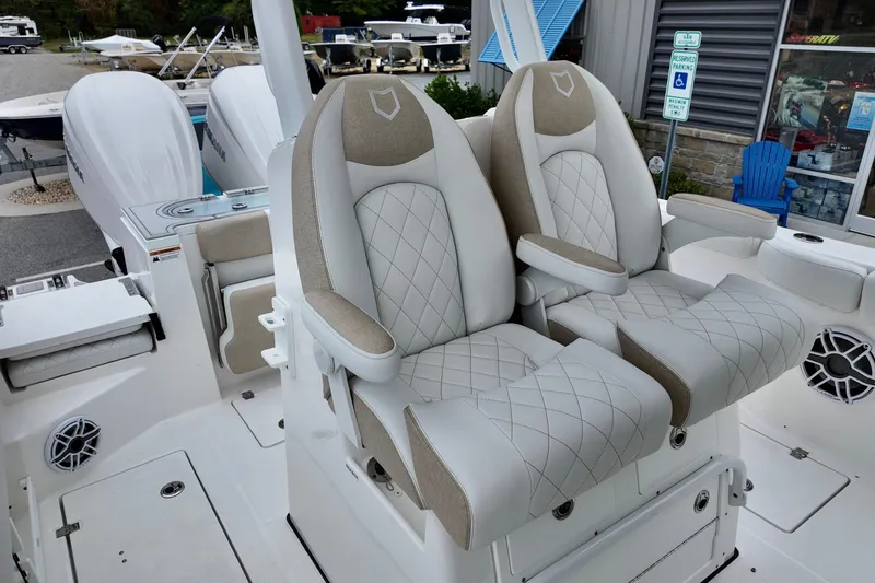 Slide: The Image of Luxury seating on 2026 Sea Fox 288 Commander boat, featuring diamond-stitched upholstery. - 7
