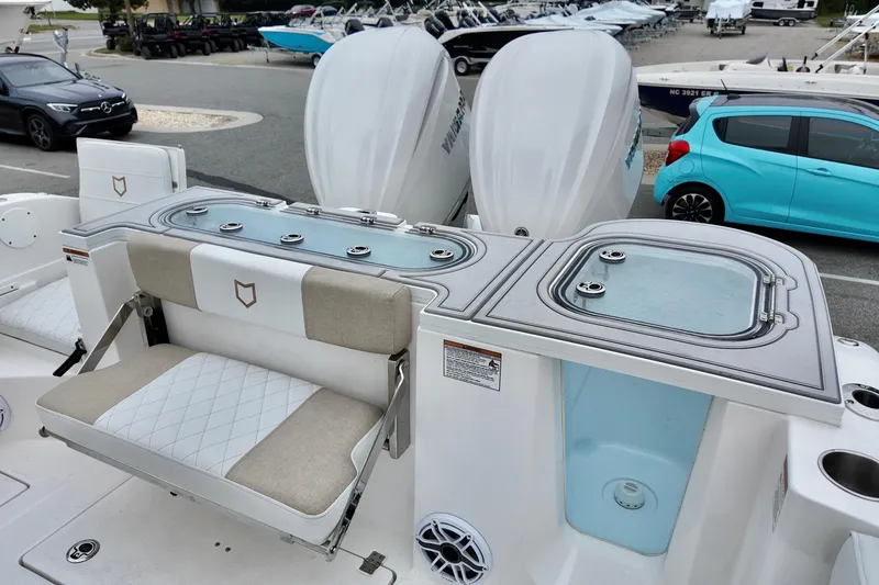 Slide: The Image of 2026 Sea Fox 288 Commander boat interior with seating and storage compartments. - 8
