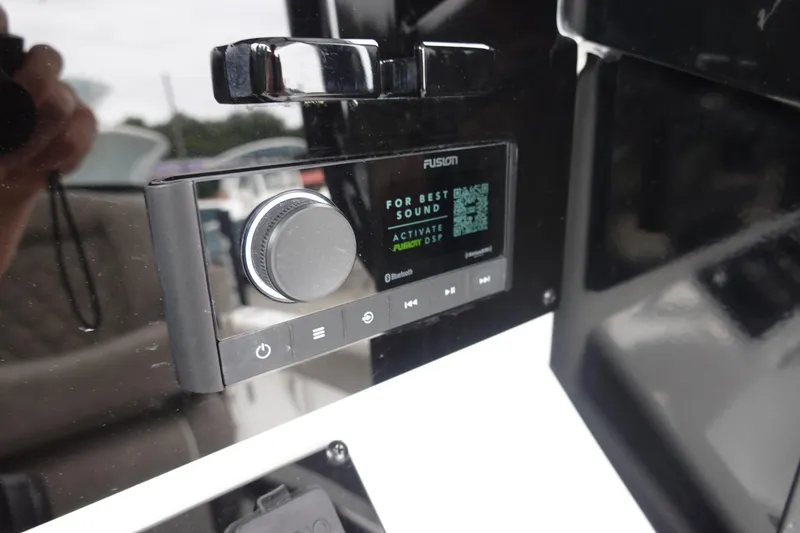 Slide: The Image of Fusion audio system on 2026 Sea Hunt Ultra 245 SE boat dashboard. - 17
