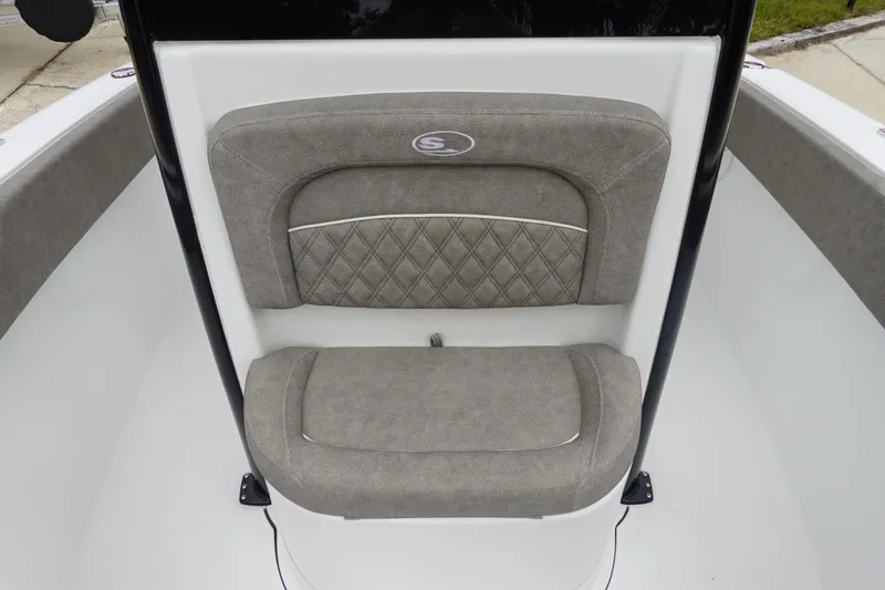 Slide: The Image of 2026 Sea Hunt Ultra 245 SE boat seat with gray upholstery and diamond stitching. - 20