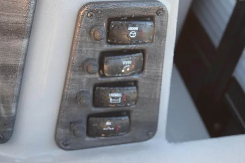 Slide: The Image of Control panel of 2023 Qwest 818 XRE E Class XRE Fish LT boat. - 13