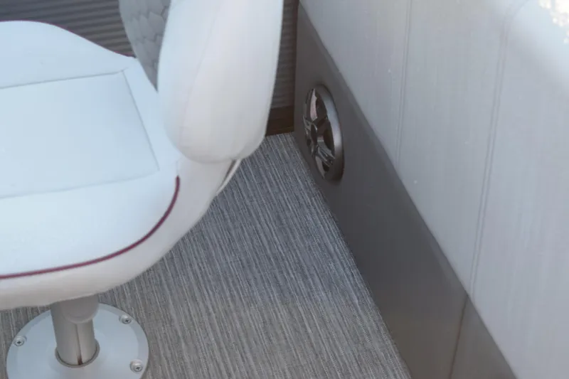 Slide: The Image of 2023 Qwest 818 XRE E Class XRE Fish LT boat interior with white seat and speaker. - 17