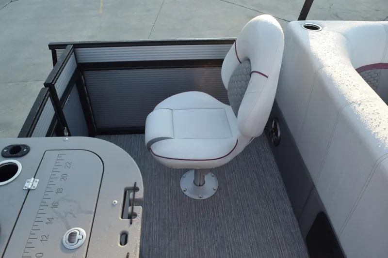 Slide: The Image of 2023 Qwest 818 XRE E Class XRE Fish LT boat interior with swivel seat and fishing station. - 18