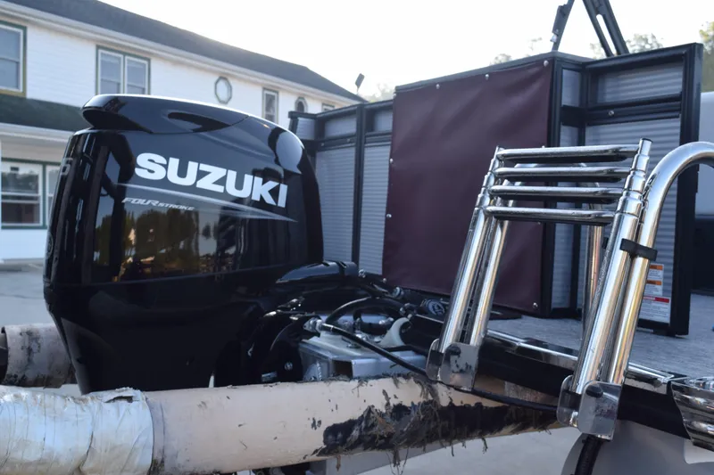 Slide: The Image of 2023 Qwest 818 XRE E Class XRE Fish LT with Suzuki outboard motor. - 4