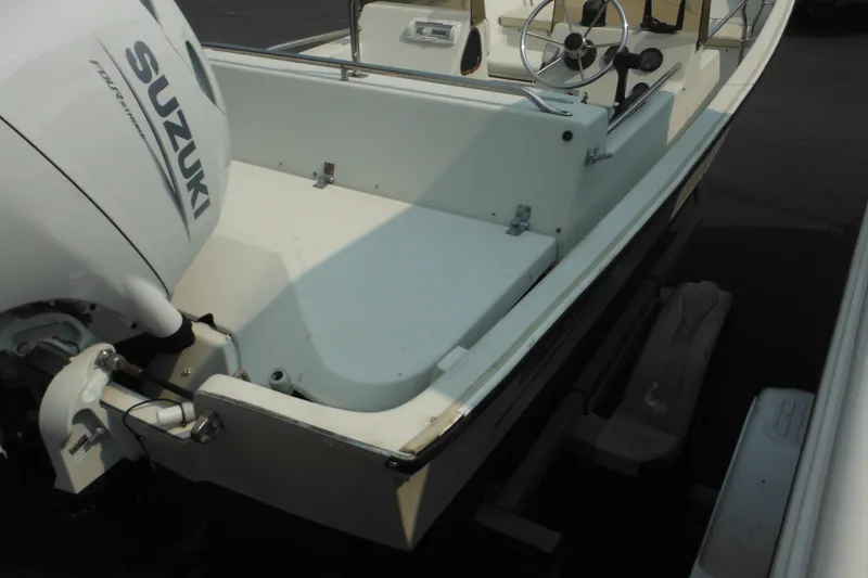 Slide: The Image of 1988 Boston Whaler 17 Super Sport with Suzuki outboard motor, interior view. - 12