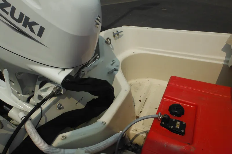 Slide: The Image of 1988 Boston Whaler 17 Super Sport with Suzuki outboard motor and red fuel tank. - 36