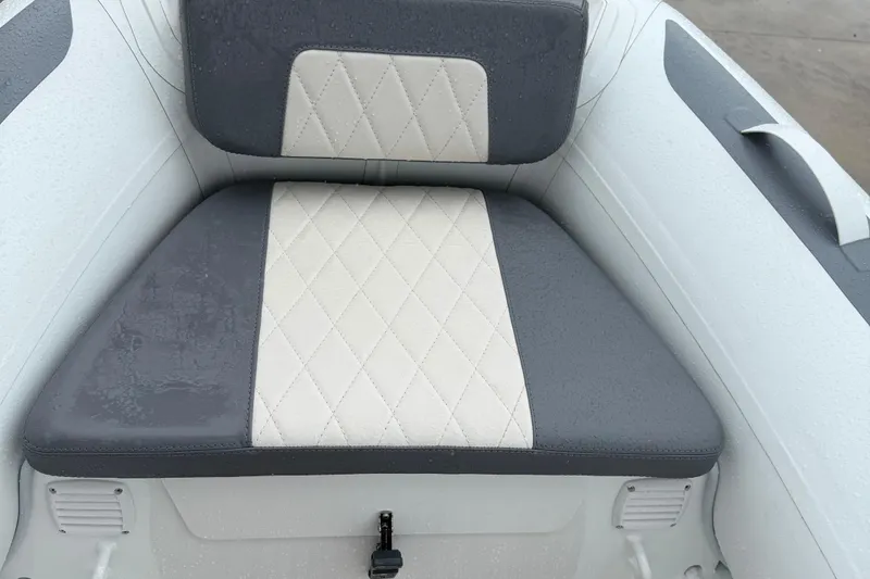 Slide: The Image of Quilted seat of 2026 Gala A300L boat, featuring gray and white upholstery. - 9