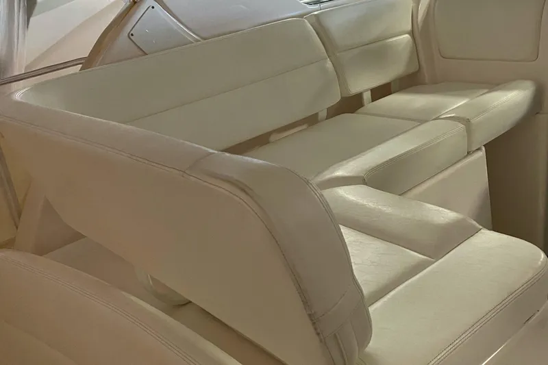 Slide: The Image of 2005 Tiara Yachts 3600 Sovran interior seating with cream upholstery. - 18
