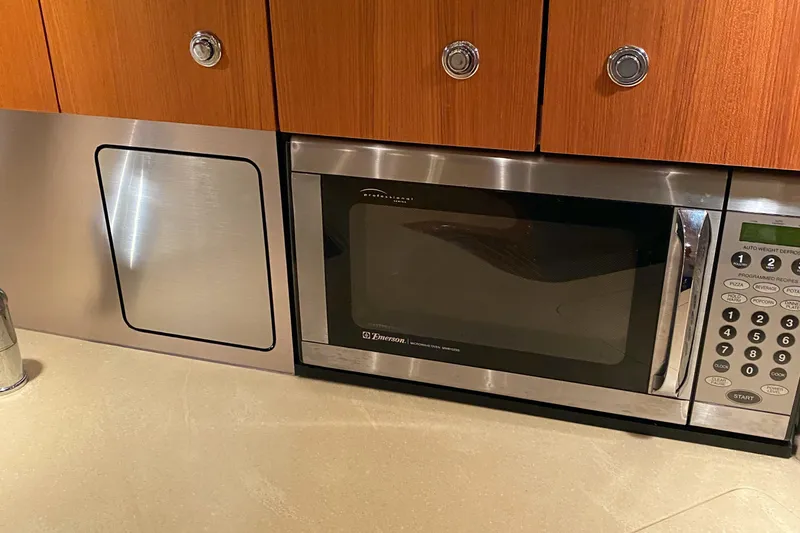 Slide: The Image of Built-in microwave in 2005 Tiara Yachts 3600 Sovran kitchen area. - 30