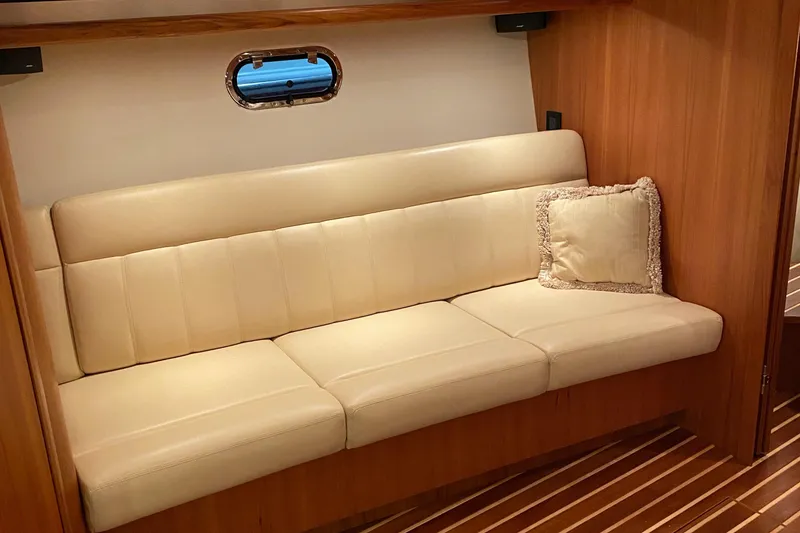Slide: The Image of 2005 Tiara Yachts 3600 Sovran interior with cream sofa and wooden flooring. - 40