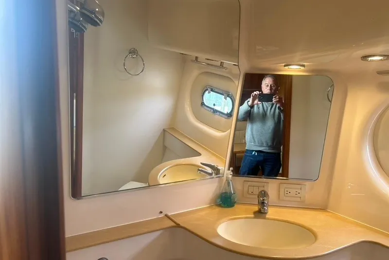 Slide: The Image of 2005 Tiara Yachts 3600 Sovran bathroom interior with mirror and sink. - 51