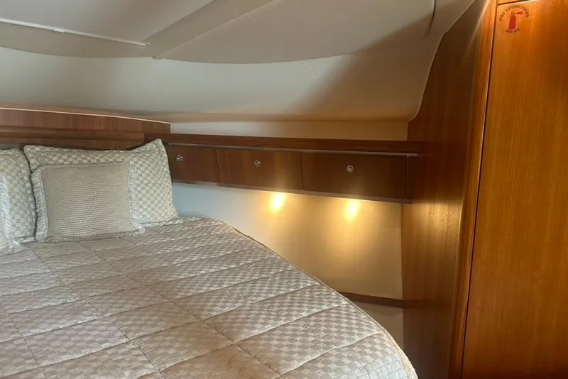 Slide: The Image of Luxurious cabin interior of 2005 Tiara Yachts 3600 Sovran with cozy bedding. - 60