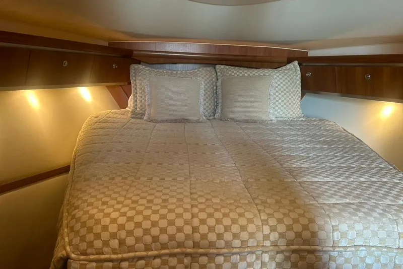 Slide: The Image of Luxurious cabin interior of 2005 Tiara Yachts 3600 Sovran with cozy bedding. - 62