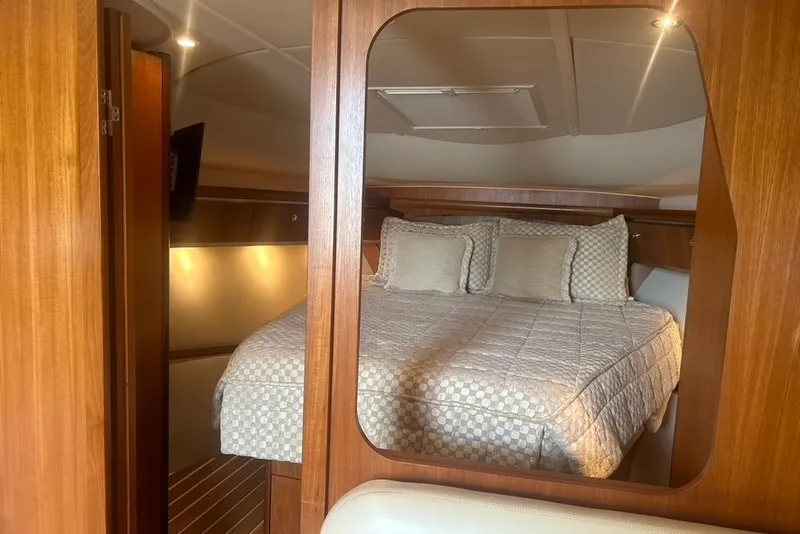 Slide: The Image of Luxurious cabin interior of 2005 Tiara Yachts 3600 Sovran with cozy bedding. - 64