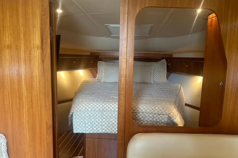 Slide: The Image of Luxurious cabin interior of 2005 Tiara Yachts 3600 Sovran with cozy bedding. - 65