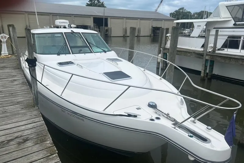 Slide: The Image of 2005 Tiara Yachts 3600 Sovran docked at marina, showcasing sleek design and modern features. - 78