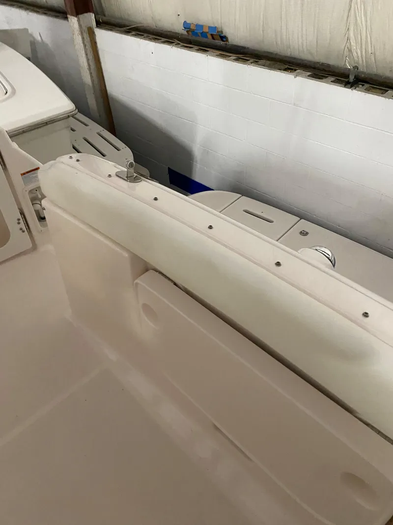 Slide: The Image of 2005 Tiara Yachts 3600 Sovran interior seating area in a storage facility. - 8