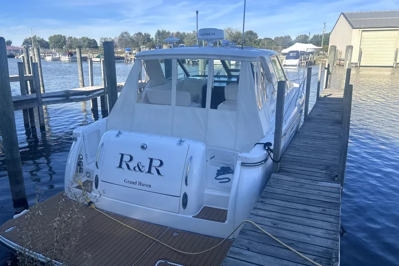 Slide: The Image of 2005 Tiara Yachts 3600 Sovran docked at marina, rear view. - 89