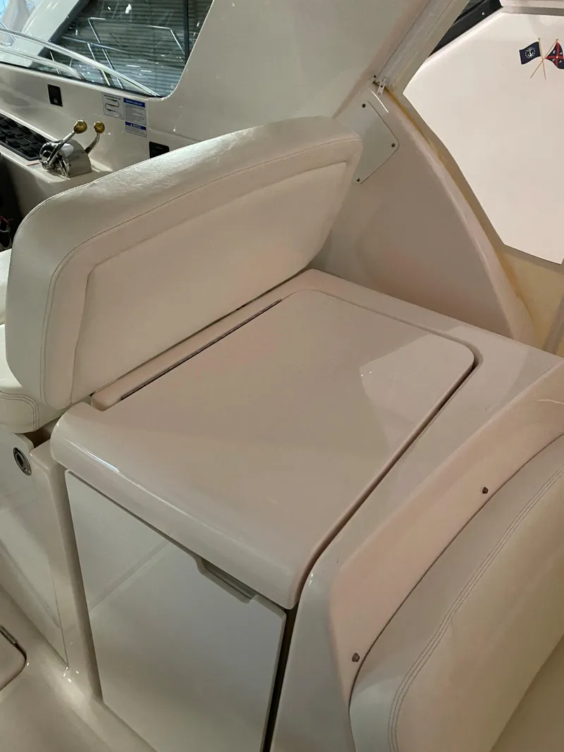 Slide: The Image of 2005 Tiara Yachts 3600 Sovran interior seating and storage area. - 9