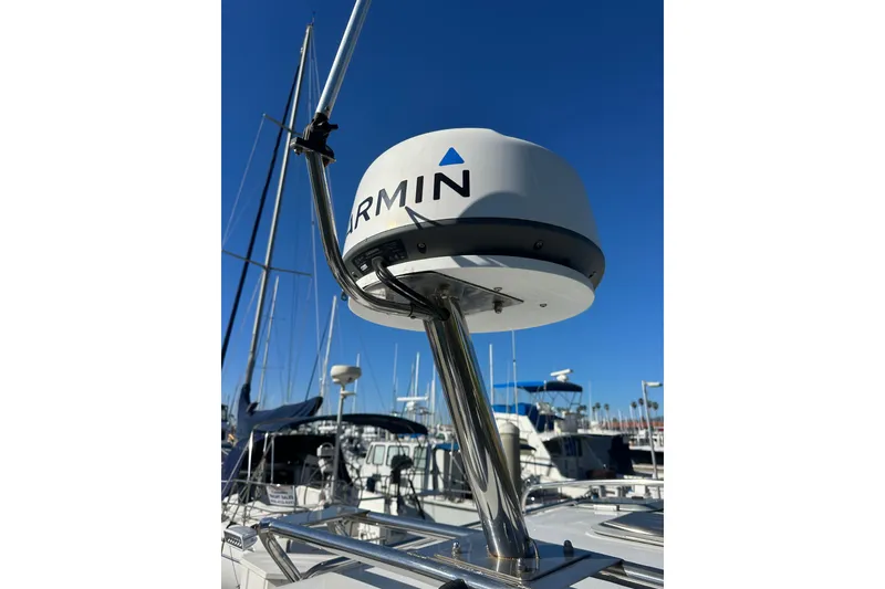 Slide: The Image of Radar system on 2004 Glacier Bay 2680 Coastal Runner boat, marina background. - 14