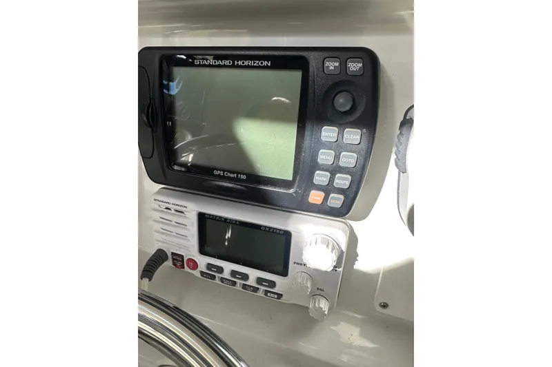 Slide: The Image of 2004 Glacier Bay 2680 Coastal Runner navigation equipment, featuring Standard Horizon GPS and radio. - 17