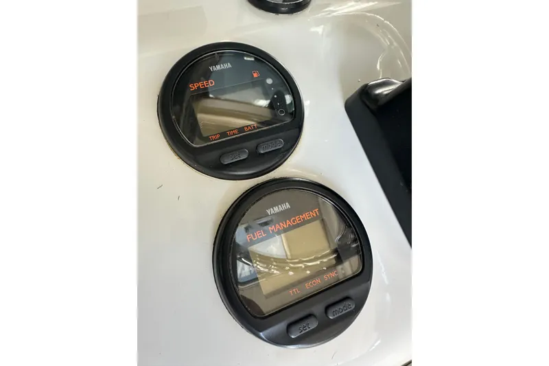 Slide: The Image of Yamaha speed and fuel management gauges on 2004 Glacier Bay 2680 Coastal Runner boat. - 21