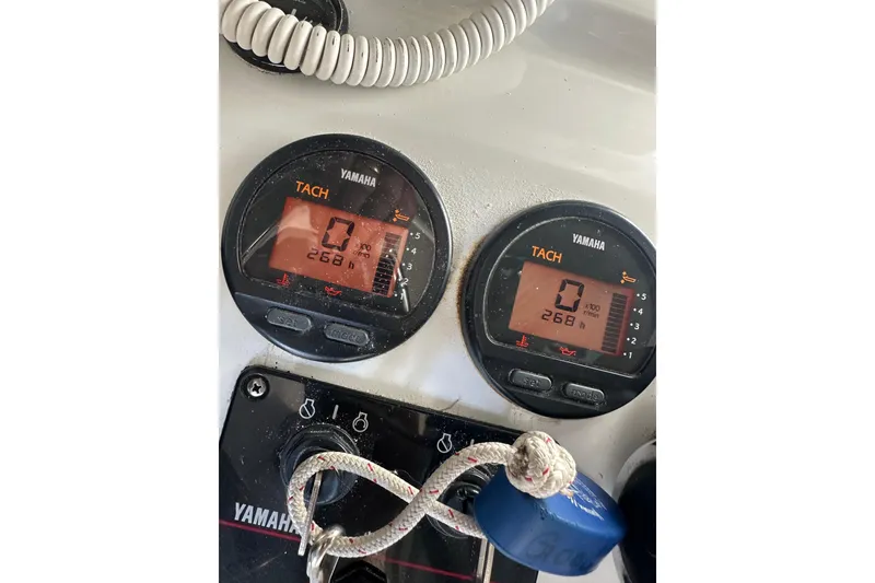 Slide: The Image of Yamaha tachometers on 2004 Glacier Bay 2680 Coastal Runner dashboard, showing 268 hours. - 23