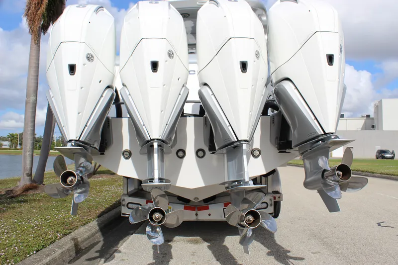 Slide: The Image of 2020 Mystic Powerboats M4200 with four powerful outboard engines. - 12