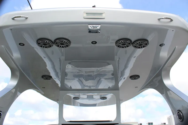 Slide: The Image of 2020 Mystic Powerboats M4200, sleek design with integrated speakers and modern features. - 32