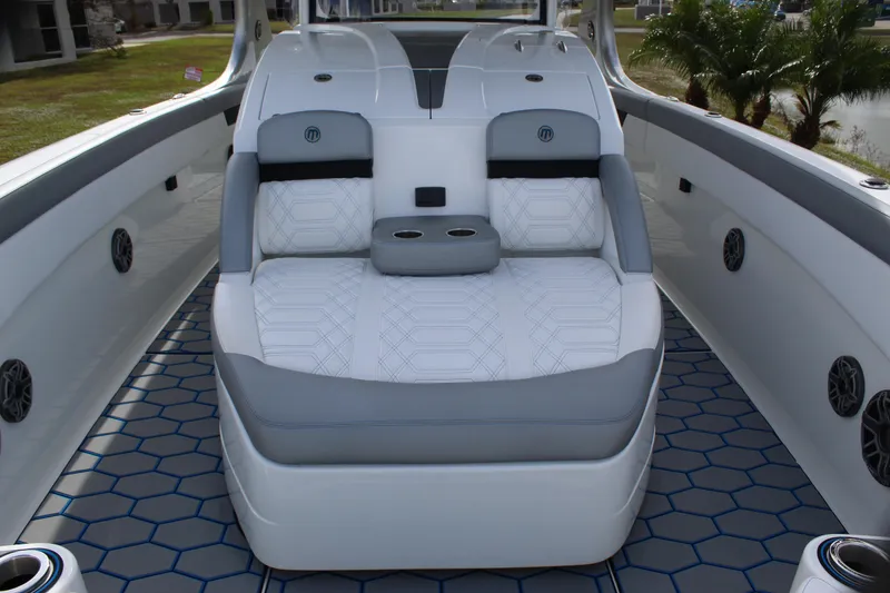 Slide: The Image of 2020 Mystic Powerboats M4200 interior with luxurious seating and modern design. - 44