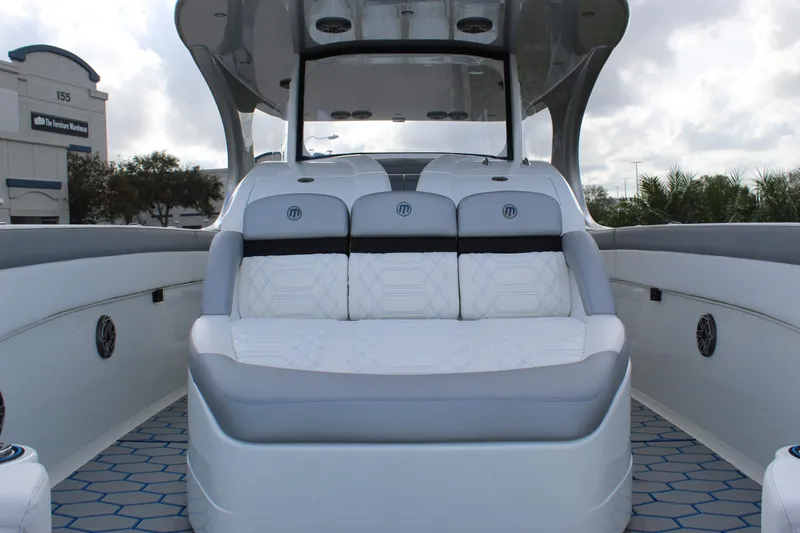 Slide: The Image of 2020 Mystic Powerboats M4200 interior with luxurious seating and modern design. - 46