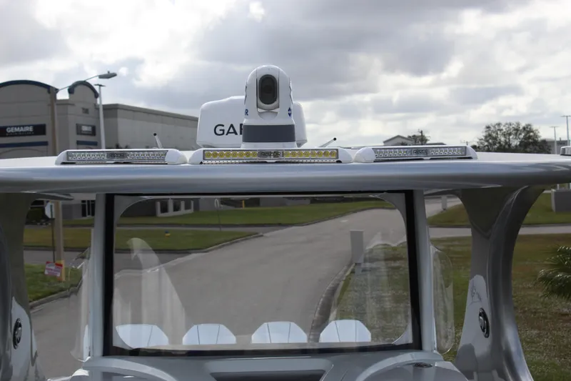 Slide: The Image of 2020 Mystic Powerboats M4200 with advanced navigation equipment and sleek design. - 47