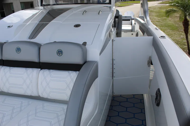 Slide: The Image of 2020 Mystic Powerboats M4200 interior with sleek seating and modern design. - 48