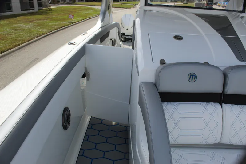 Slide: The Image of 2020 Mystic Powerboats M4200 interior with sleek seating and modern design. - 49