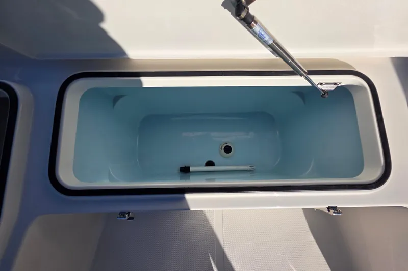 Slide: The Image of Livewell compartment in 2026 Ranger 2360 Bay boat, featuring hydraulic lift. - 27
