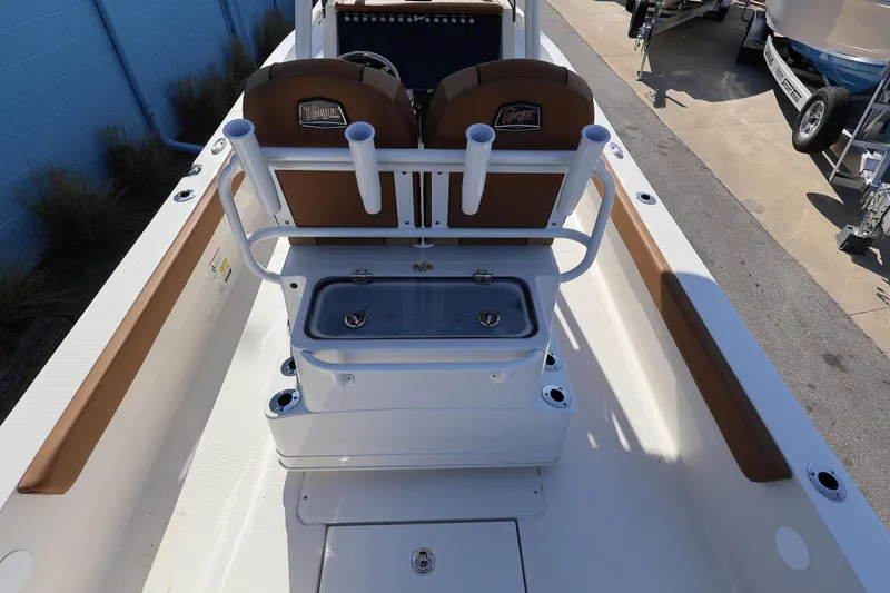 Slide: The Image of 2026 Ranger 2360 Bay boat interior with seating and rod holders. - 46